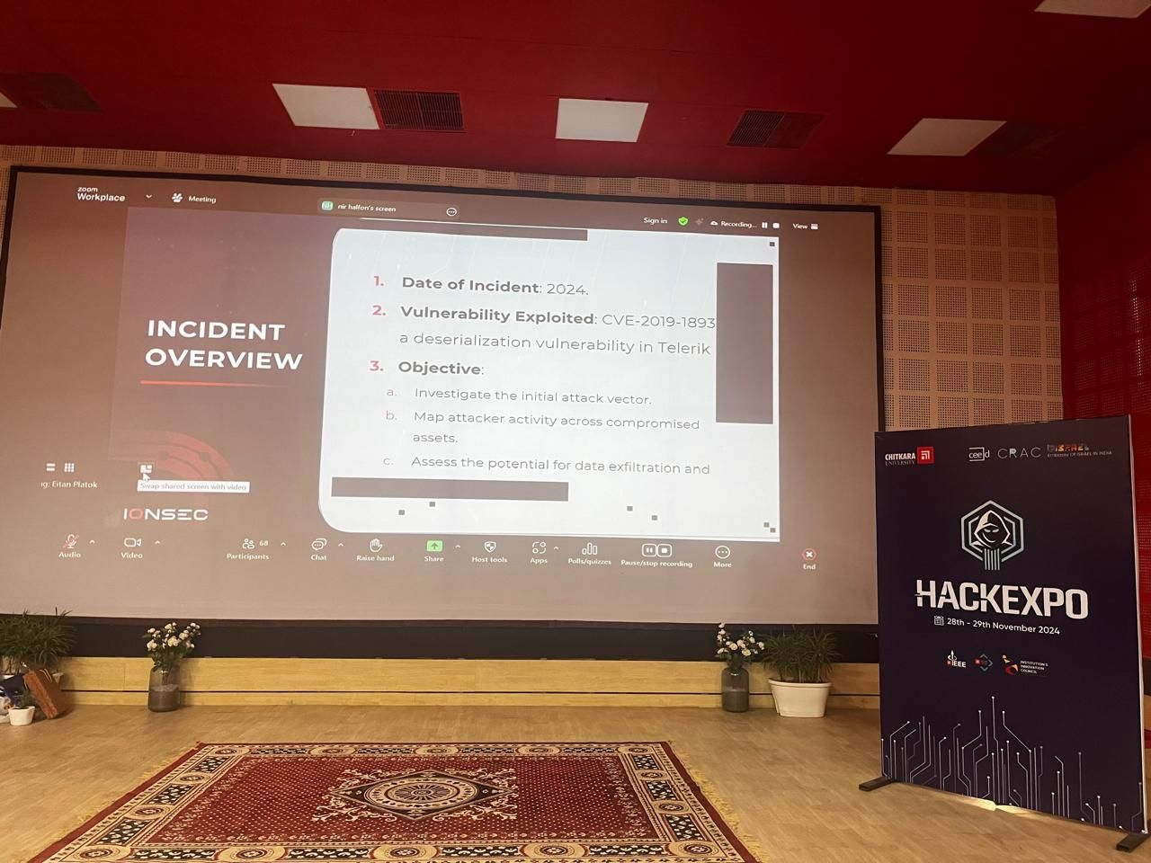 Nir Halfon presenting “Breach at the Frontline” at HackExpo 2024
